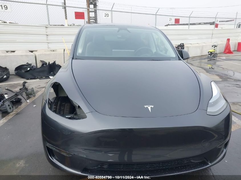 2024 Tesla Model Y Long Range Dual Motor All-Wheel Drive VIN: 7SAYGDEEXRF180731 Lot: 40554798