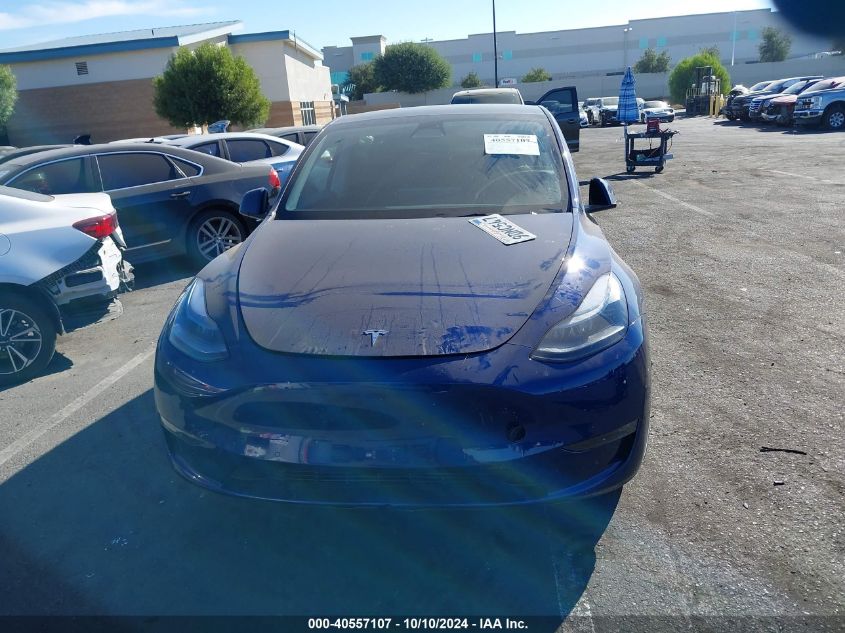 2022 Tesla Model Y Long Range Dual Motor All-Wheel Drive VIN: 7SAYGDEE8NF557874 Lot: 40557107