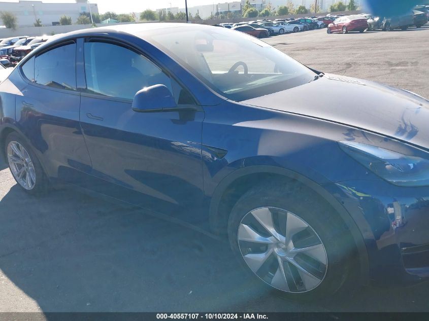 2022 Tesla Model Y Long Range Dual Motor All-Wheel Drive VIN: 7SAYGDEE8NF557874 Lot: 40557107