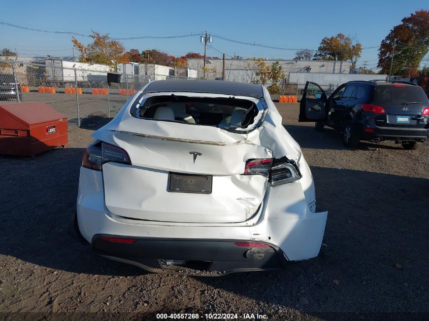 2021 Tesla Model Y Performance Dual Motor All-Wheel Drive VIN: 5YJYGDEF1MF209421 Lot: 40557268