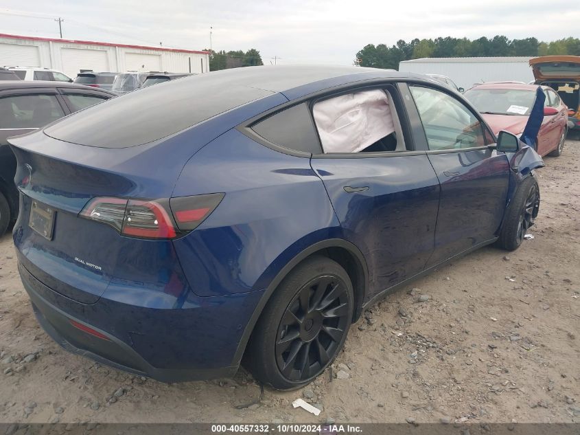 VIN 7SAYGAEE6NF515816 2022 TESLA MODEL Y no.4