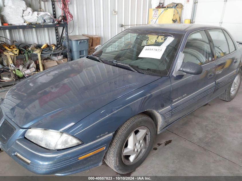 1995 Pontiac Grand Am Se VIN: 1G2NE55D9SC750020 Lot: 40557823