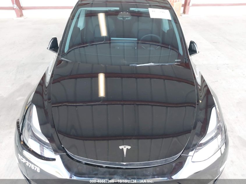 2023 Tesla Model Y Awd/Long Range Dual Motor All-Wheel Drive VIN: 7SAYGAEE9PF716337 Lot: 40557965