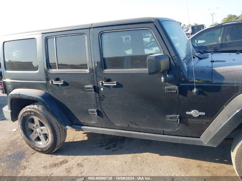 2015 Jeep Wrangler Unlimited Freedom Edition VIN: 1C4BJWDG2FL593822 Lot: 40560735