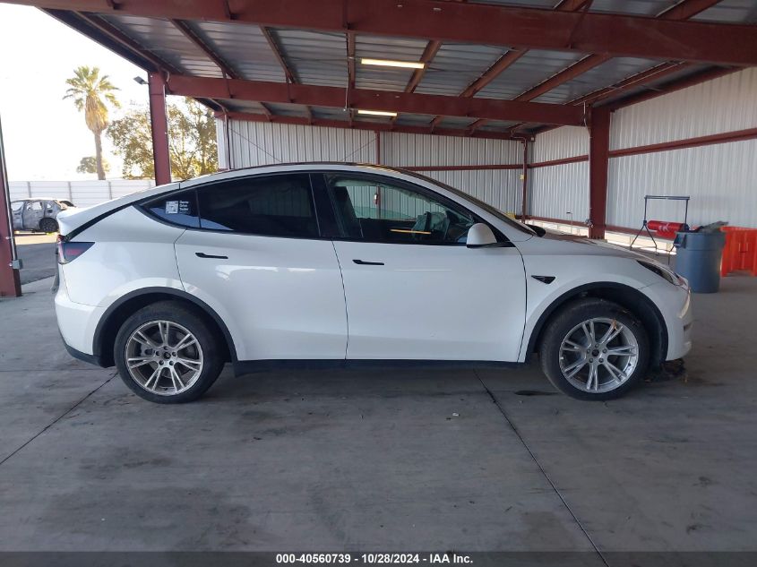 2023 Tesla Model Y Awd/Long Range Dual Motor All-Wheel Drive VIN: 7SAYGDEE6PF742623 Lot: 40560739