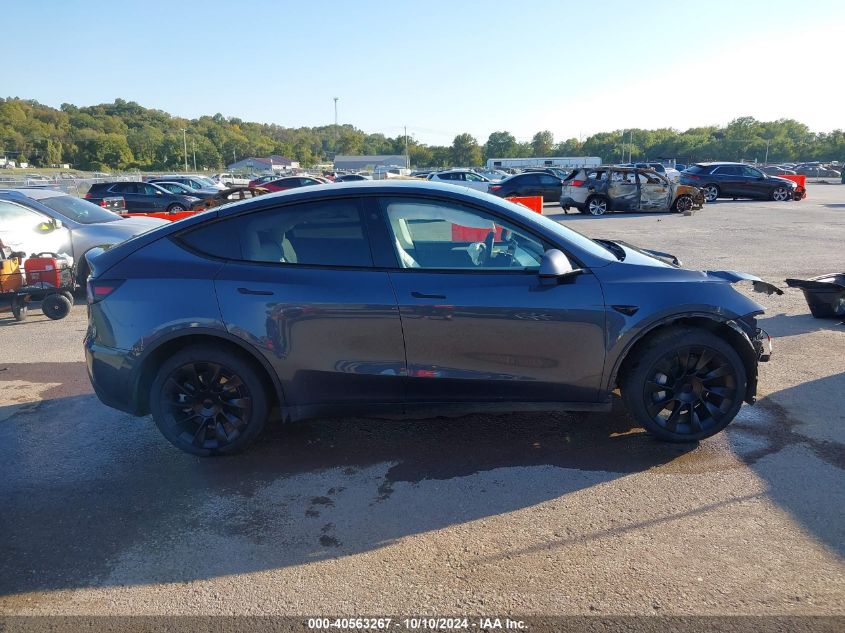 2023 Tesla Model Y Awd/Long Range Dual Motor All-Wheel Drive VIN: 7SAYGDEE8PA176557 Lot: 40563267