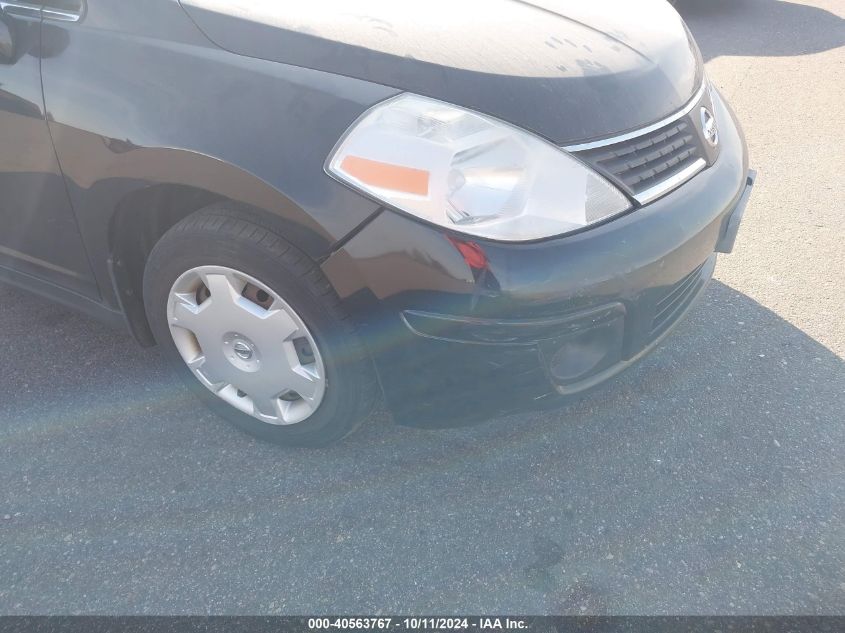 2009 Nissan Versa 1.8S VIN: 3N1BC11E79L353743 Lot: 40563767