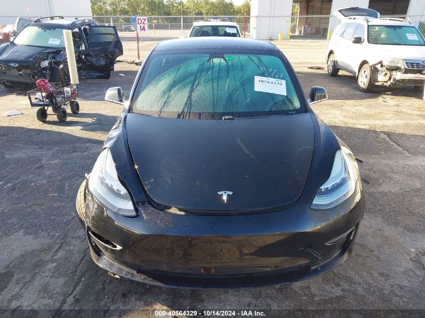 2019 Tesla Model 3 VIN: 5YJ3E1EAXKF325409 Lot: 40564329