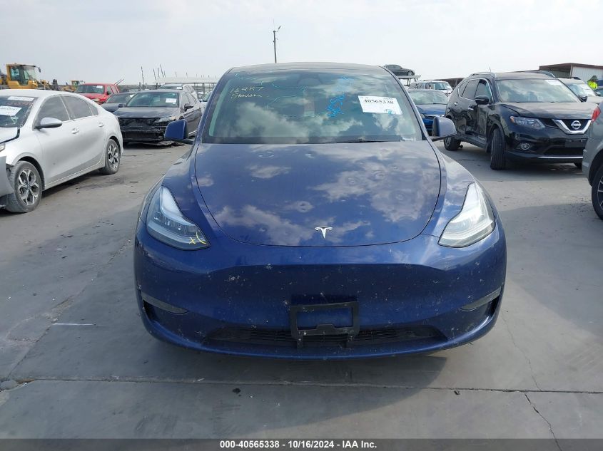 2023 Tesla Model Y Awd/Long Range Dual Motor All-Wheel Drive VIN: 7SAYGDEE5PA062905 Lot: 40565338