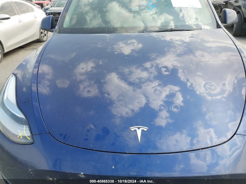 2023 Tesla Model Y Awd/Long Range Dual Motor All-Wheel Drive VIN: 7SAYGDEE5PA062905 Lot: 40565338