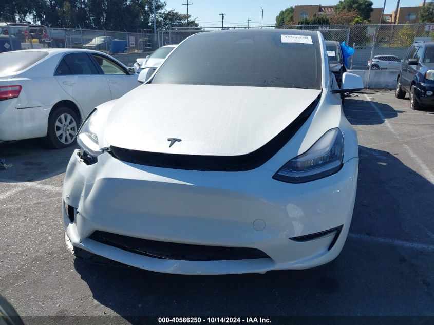 2023 Tesla Model Y Awd/Long Range Dual Motor All-Wheel Drive VIN: 7SAYGAEE6PF611528 Lot: 40566250