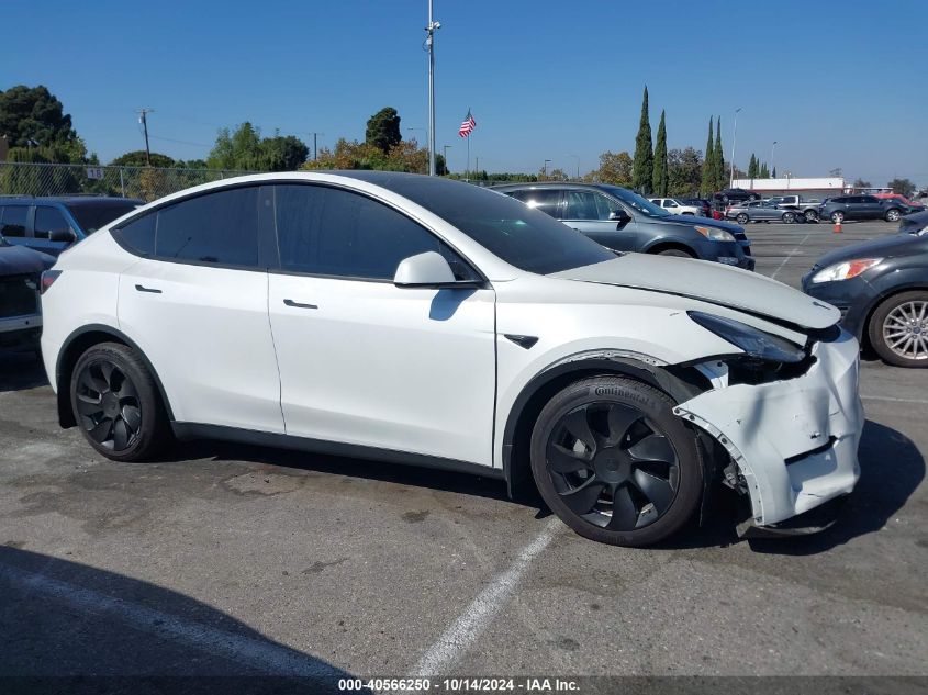 2023 Tesla Model Y Awd/Long Range Dual Motor All-Wheel Drive VIN: 7SAYGAEE6PF611528 Lot: 40566250