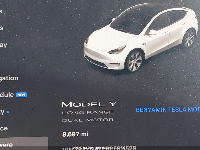 2023 Tesla Model Y Awd/Long Range Dual Motor All-Wheel Drive VIN: 7SAYGAEE6PF611528 Lot: 40566250