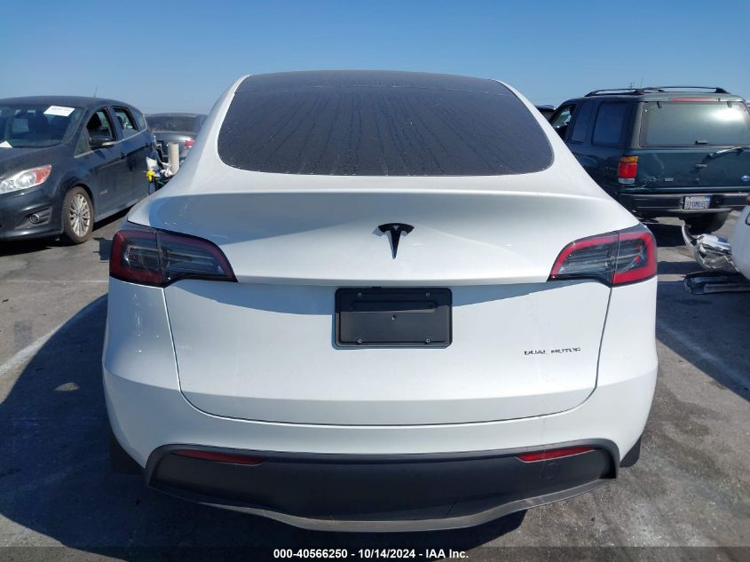 2023 Tesla Model Y Awd/Long Range Dual Motor All-Wheel Drive VIN: 7SAYGAEE6PF611528 Lot: 40566250