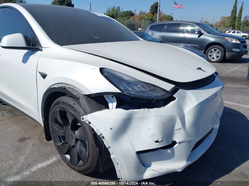 2023 Tesla Model Y Awd/Long Range Dual Motor All-Wheel Drive VIN: 7SAYGAEE6PF611528 Lot: 40566250