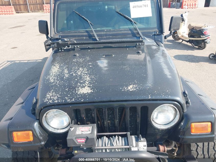 2000 Jeep Wrangler Sport VIN: 1J4FA49S4YP762313 Lot: 40566701