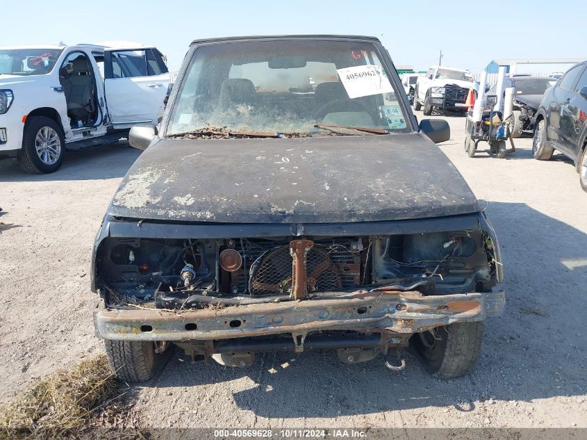 1995 Geo Tracker VIN: 2CNBE18U1S6902797 Lot: 40569628