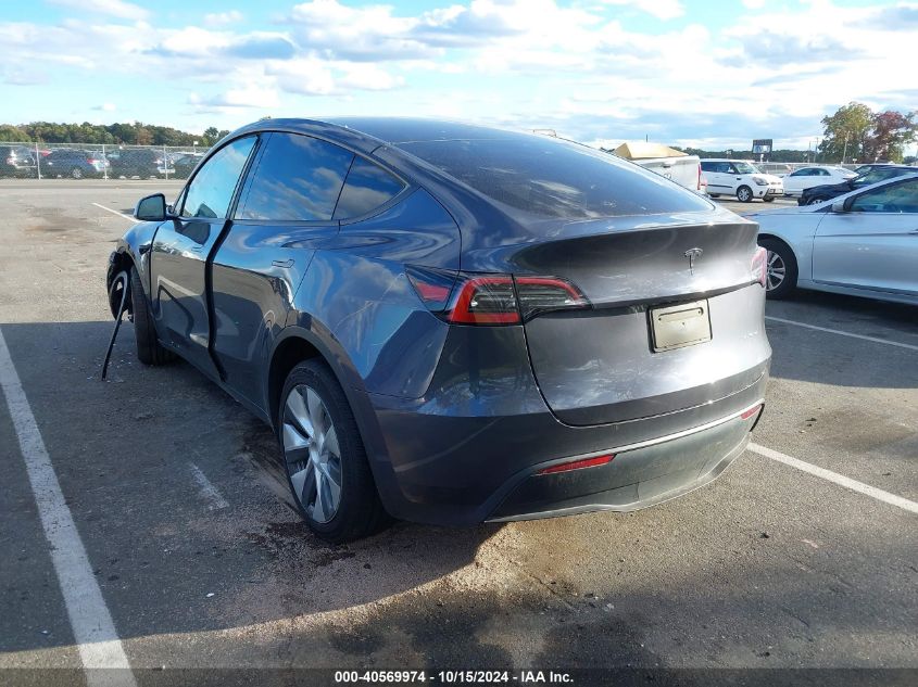 2023 Tesla Model Y Awd/Long Range Dual Motor All-Wheel Drive VIN: 7SAYGDEE1PF891960 Lot: 40569974