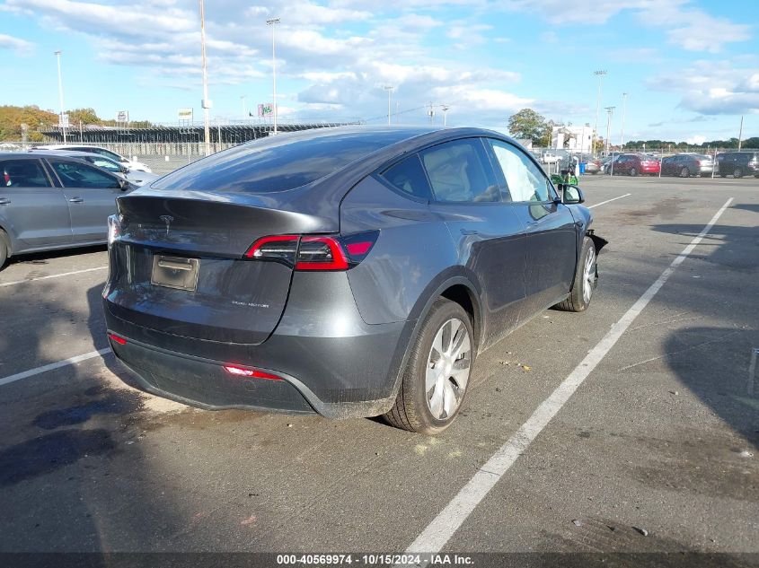 2023 Tesla Model Y Awd/Long Range Dual Motor All-Wheel Drive VIN: 7SAYGDEE1PF891960 Lot: 40569974