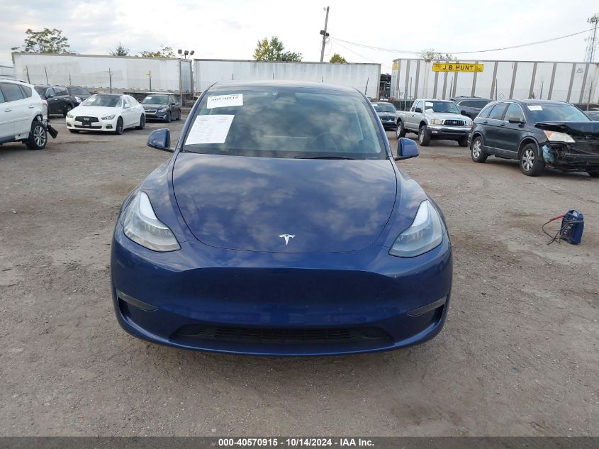 2023 Tesla Model Y VIN: 7SAYGDEE3PF909360 Lot: 40570915