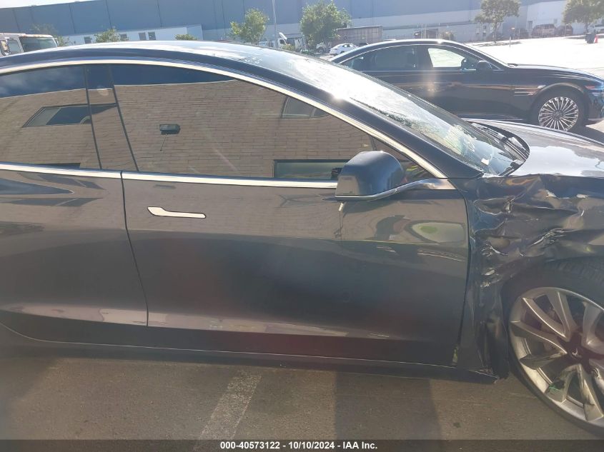 2018 Tesla Model 3 VIN: 5YJ3E1EA9JF049741 Lot: 40573122