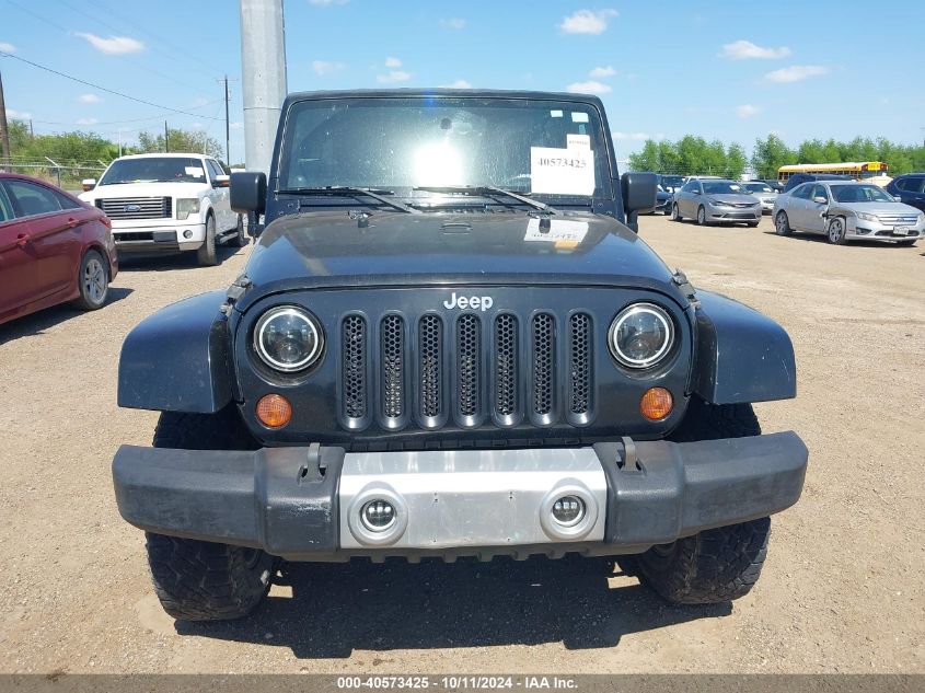 2008 Jeep Wrangler Unlimited Sahara VIN: 1J4GA59168L574580 Lot: 40573425