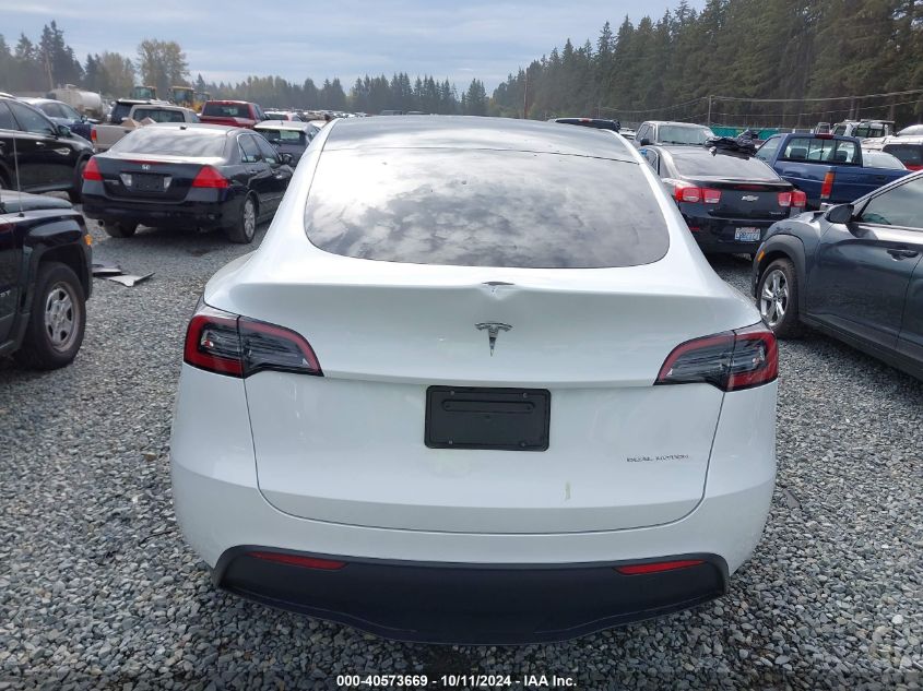 2023 Tesla Model Y VIN: 7SAYGDEE7PF825106 Lot: 40573669