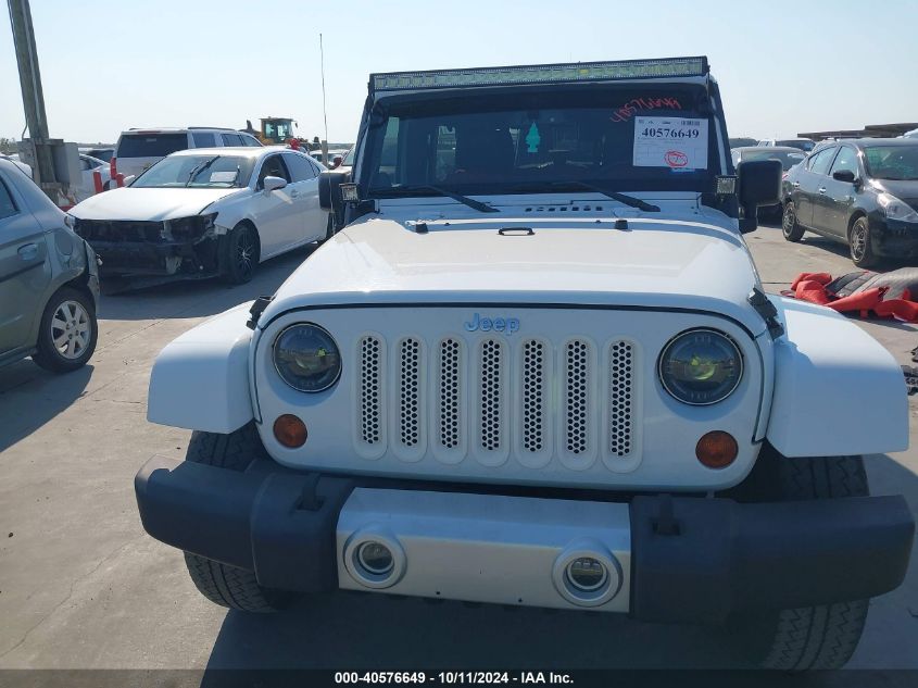 2013 Jeep Wrangler Unlimited Sahara VIN: 1C4BJWEG4DL624824 Lot: 40576649