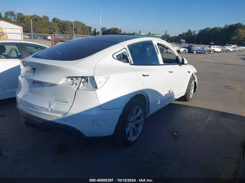 2023 Tesla Model Y Awd/Long Range Dual Motor All-Wheel Drive VIN: 7SAYGAEE2PF688882 Lot: 40580397