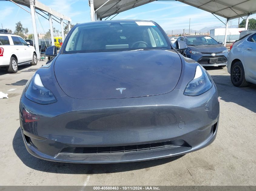 2023 Tesla Model Y VIN: 7SAYGDEEXPF852980 Lot: 40580463