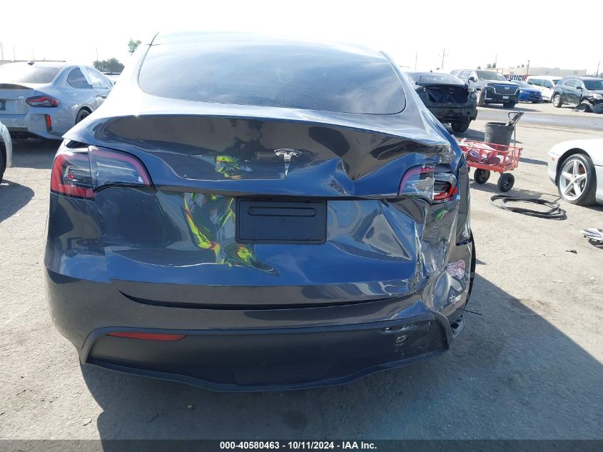 2023 Tesla Model Y VIN: 7SAYGDEEXPF852980 Lot: 40580463