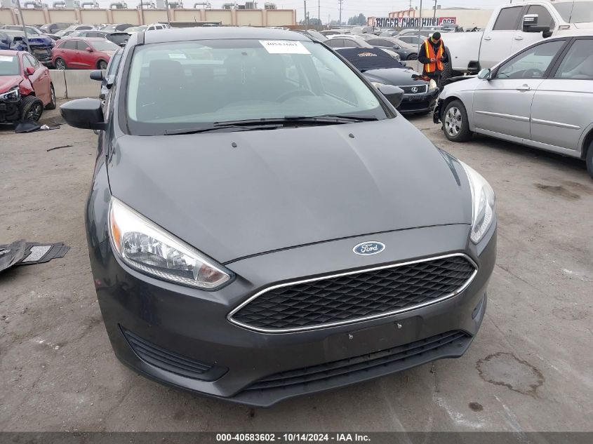 2018 Ford Focus Se VIN: 1FADP3F27JL295059 Lot: 40583602