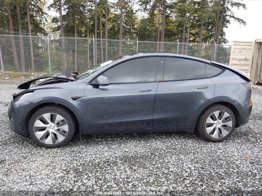 2023 Tesla Model Y Awd/Long Range Dual Motor All-Wheel Drive VIN: 7SAYGDEE1PF645877 Lot: 40585667