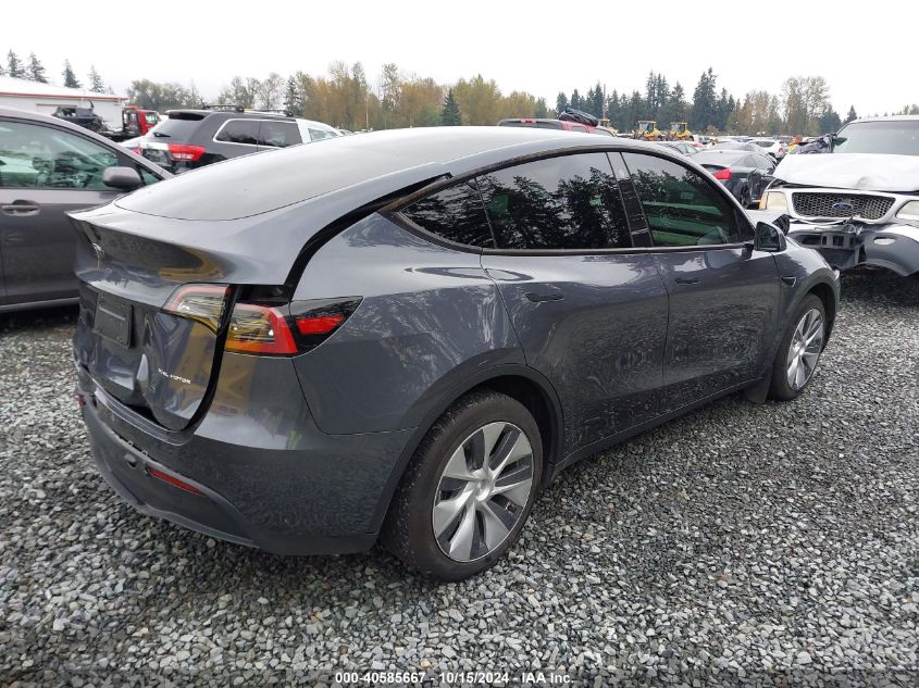 2023 Tesla Model Y Awd/Long Range Dual Motor All-Wheel Drive VIN: 7SAYGDEE1PF645877 Lot: 40585667