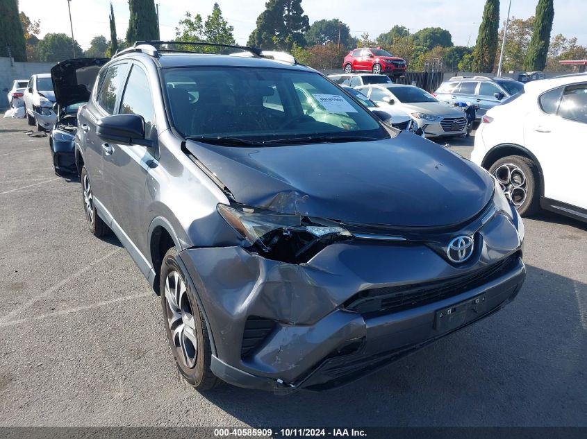 JTMBFREV7GJ100990 2016 Toyota Rav4 Le