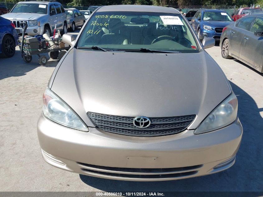 4T1BE30K42U104687 2002 Toyota Camry Xle