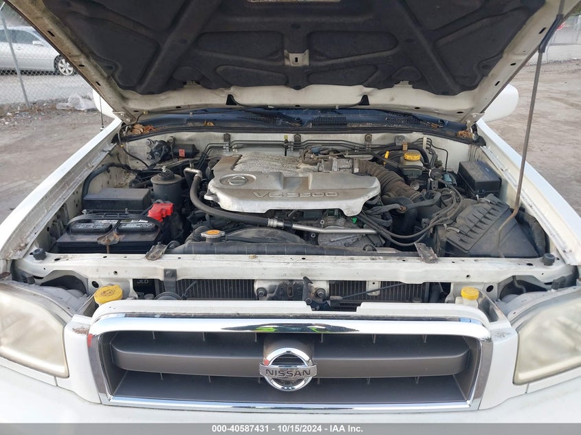 2004 Nissan Pathfinder Le Platinum VIN: JN8DR09Y54W909259 Lot: 40587431