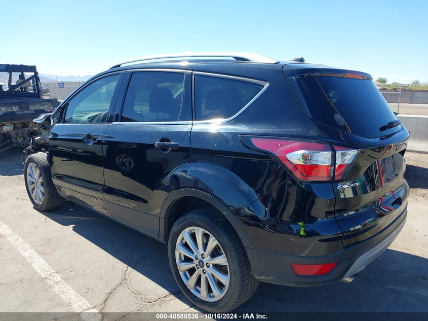 VIN 1FMCU9J99HUE09388 2017 FORD ESCAPE TITANIUM