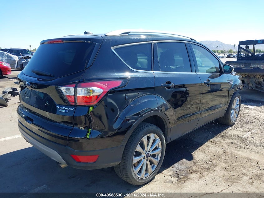 VIN 1FMCU9J99HUE09388 2017 FORD ESCAPE TITANIUM