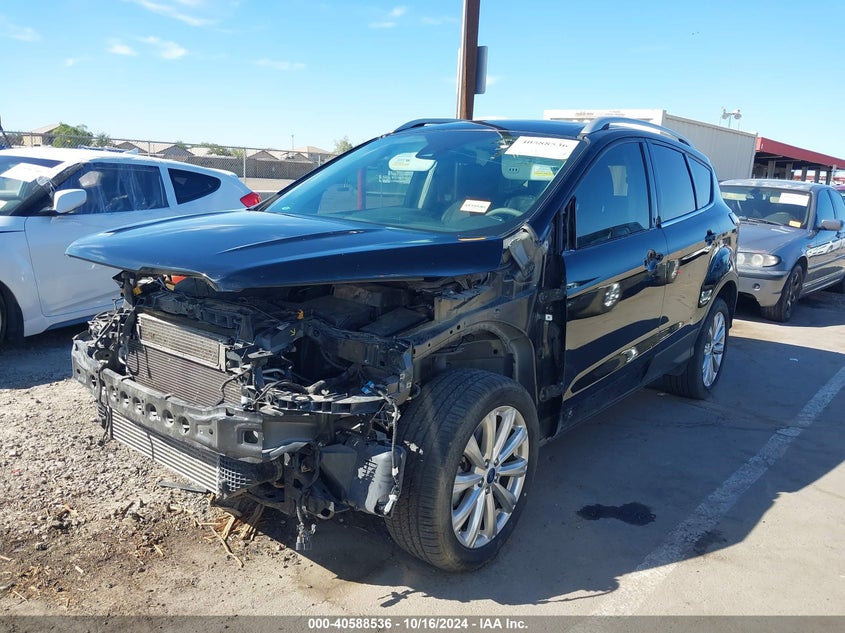 VIN 1FMCU9J99HUE09388 2017 FORD ESCAPE TITANIUM
