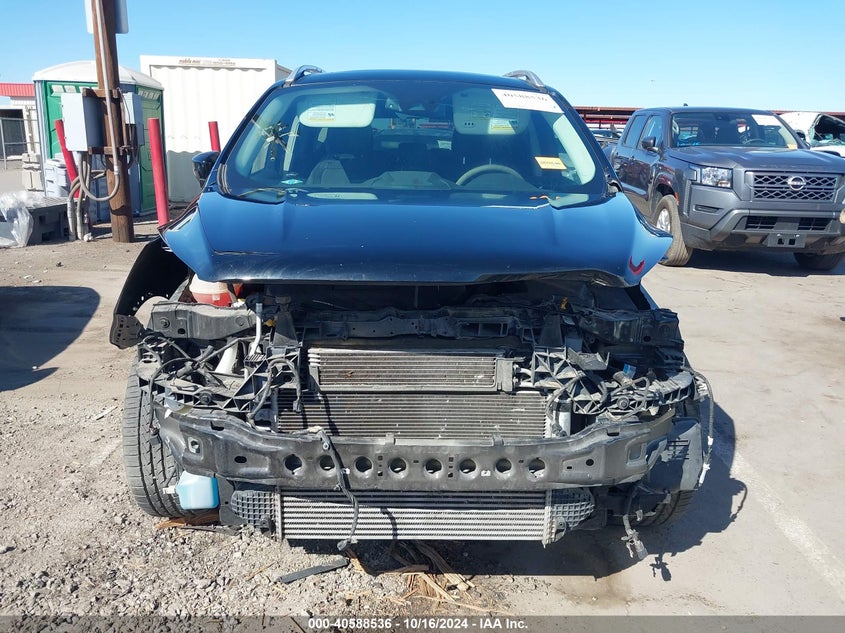 VIN 1FMCU9J99HUE09388 2017 FORD ESCAPE TITANIUM