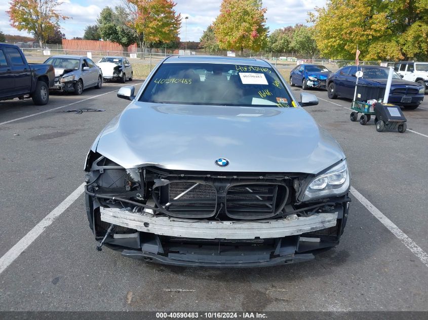 2013 BMW 740I VIN: WBAYA6C58DD143879 Lot: 40590483