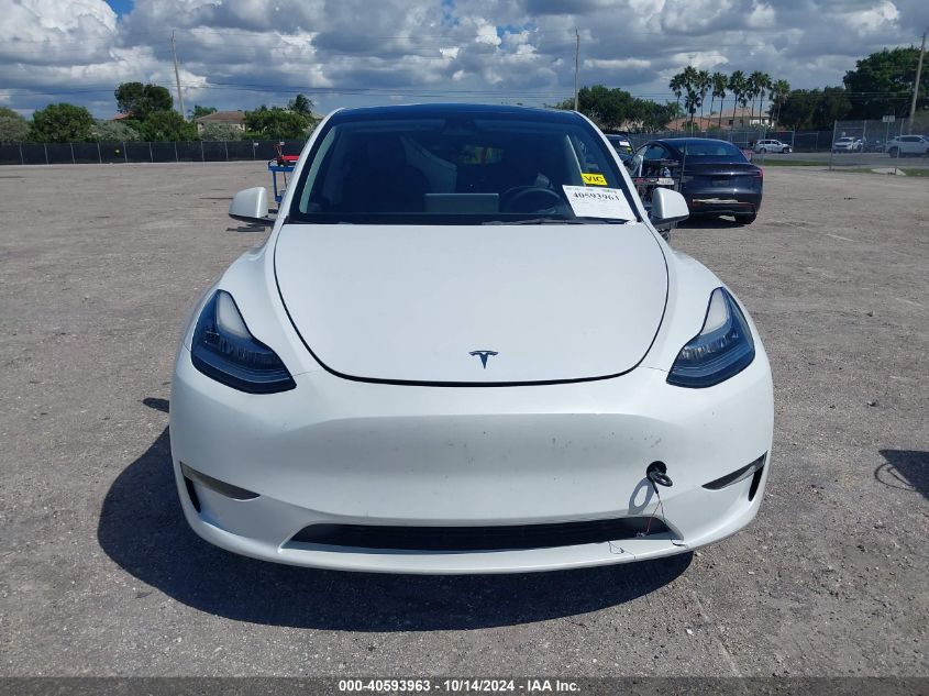 2023 Tesla Model Y Awd/Long Range Dual Motor All-Wheel Drive VIN: 7SAYGDEE8PF619633 Lot: 40593963