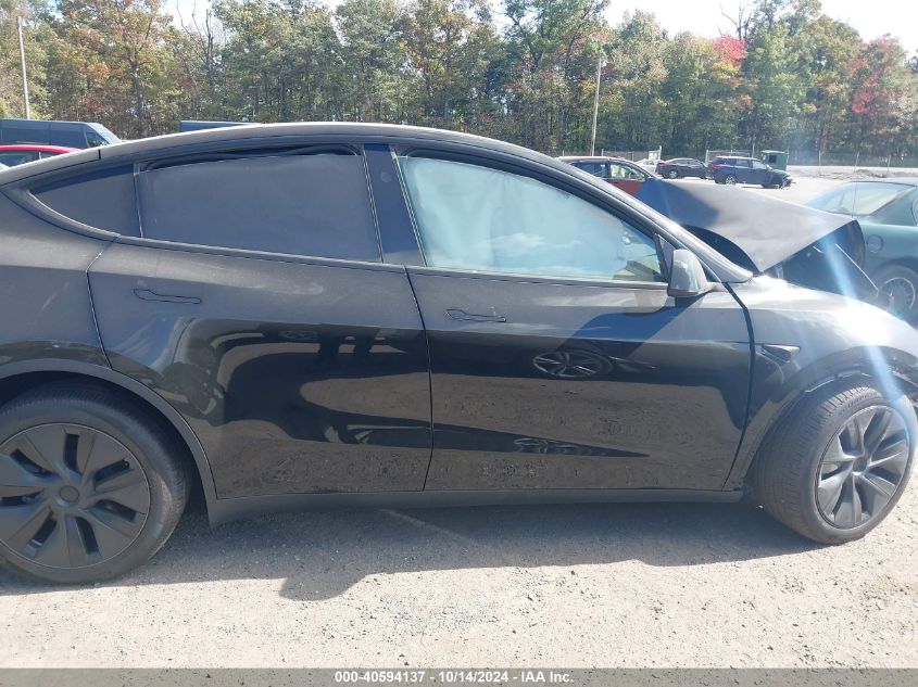 2024 Tesla Model Y Long Range Dual Motor All-Wheel Drive VIN: 7SAYGDEE1RA322705 Lot: 40594137