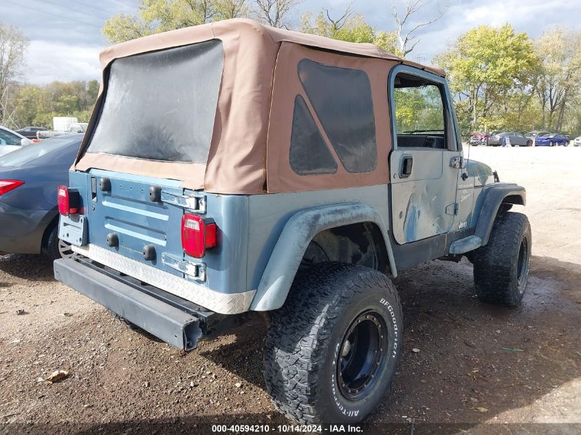 1999 Jeep Wrangler Sport VIN: 1J4FY19S3XP413619 Lot: 40594210