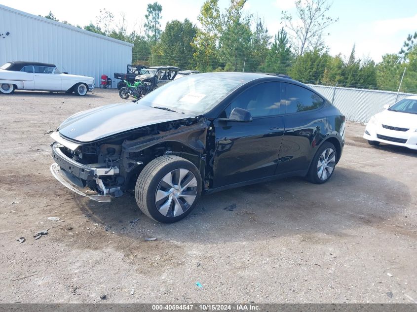 2023 Tesla Model Y Rwd VIN: 7SAYGDED0PF964260 Lot: 40594547