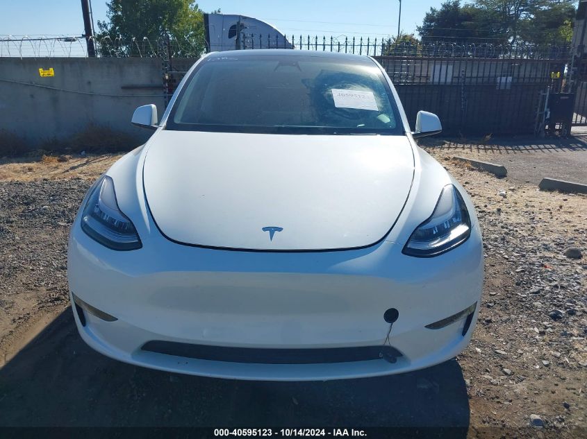 2023 Tesla Model Y Awd/Long Range Dual Motor All-Wheel Drive VIN: 7SAYGDEE6PF588608 Lot: 40595123