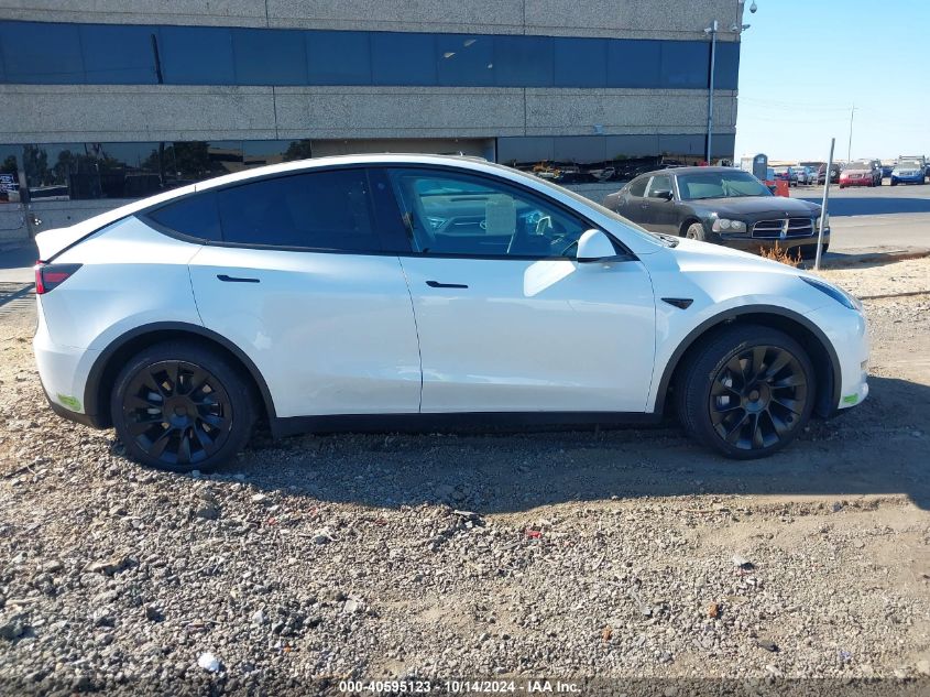 2023 Tesla Model Y Awd/Long Range Dual Motor All-Wheel Drive VIN: 7SAYGDEE6PF588608 Lot: 40595123