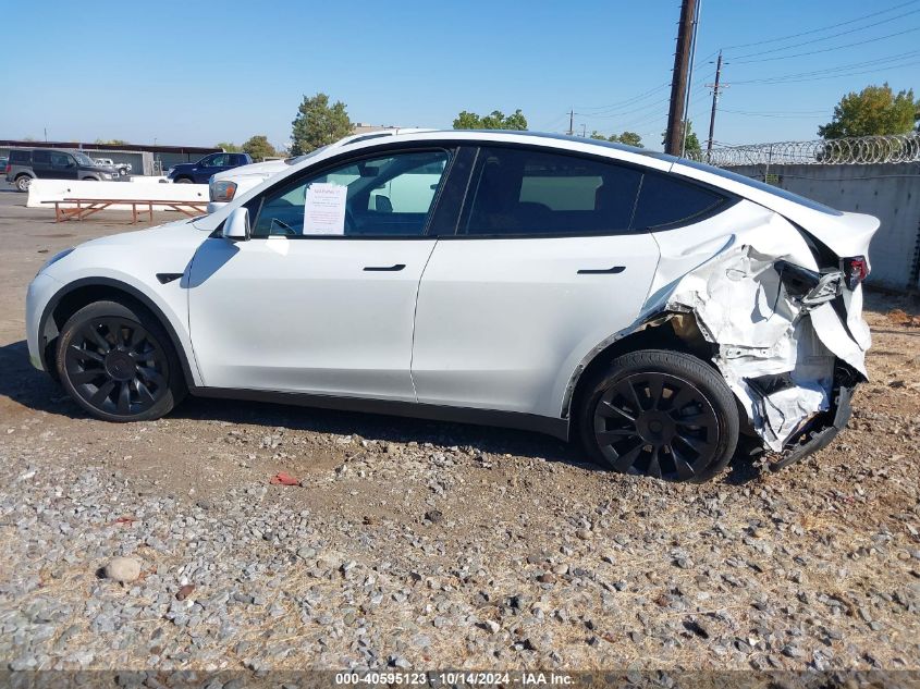 2023 Tesla Model Y Awd/Long Range Dual Motor All-Wheel Drive VIN: 7SAYGDEE6PF588608 Lot: 40595123