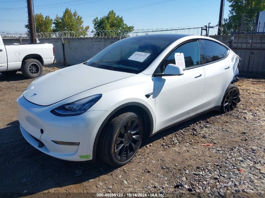 2023 Tesla Model Y Awd/Long Range Dual Motor All-Wheel Drive VIN: 7SAYGDEE6PF588608 Lot: 40595123